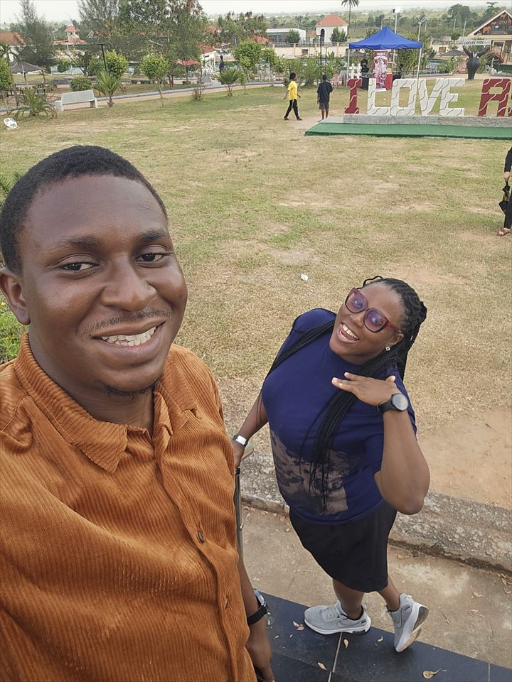 Osaro and Achi enjoying an outing together at a park