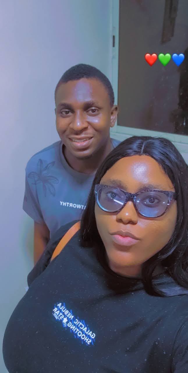 Osaro and Achi posing together in a school-day selfie