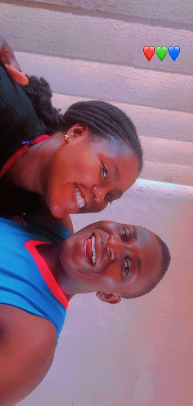 Achi and Osaro laughing together in an early selfie